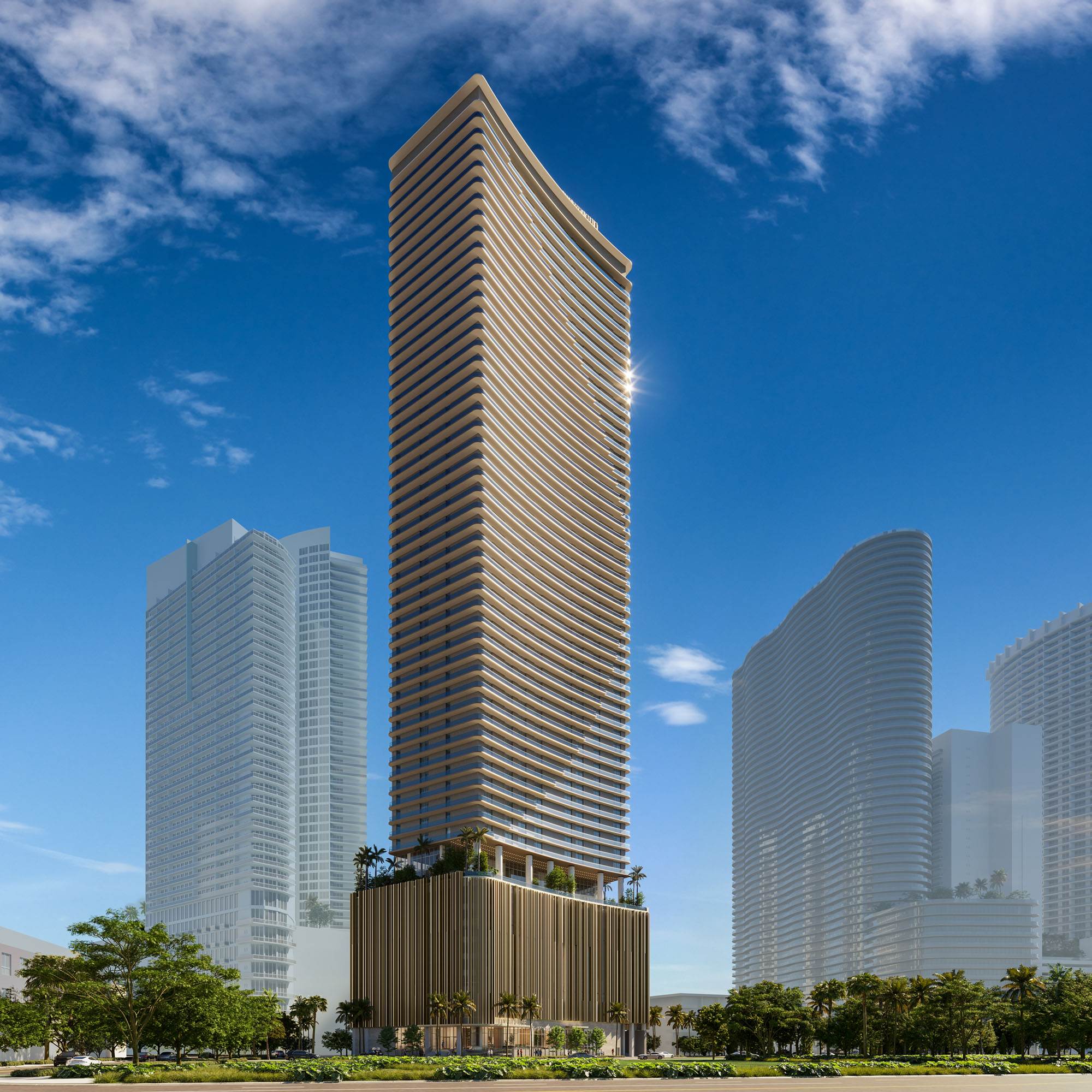 A tall, modern skyscraper with a unique curved design, standing against a clear blue sky. The building features horizontal lines that give it a wave-like appearance and a base surrounded by greenery and palm trees. Other high-rise buildings are visible in the background.