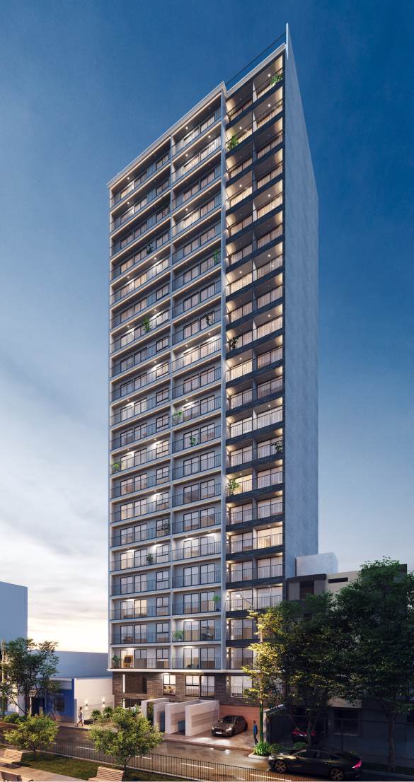 A modern high-rise residential building with a minimalist design, featuring a sleek facade with large windows and balconies. The building has a uniform structure, with each floor following a consistent architectural style. The base of the building is surrounded by greenery and a few parked cars, set against a twilight sky.